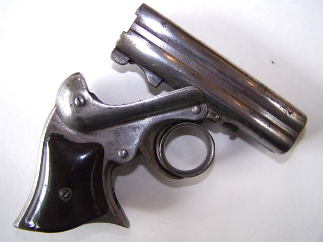 A Civil War era Remington-Elliott's Patent four barreled .32 cal. Derringer — image 4